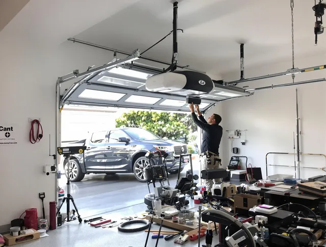 Riverview Garage Door Repair specialist installing smart garage door opener system in Riverview home
